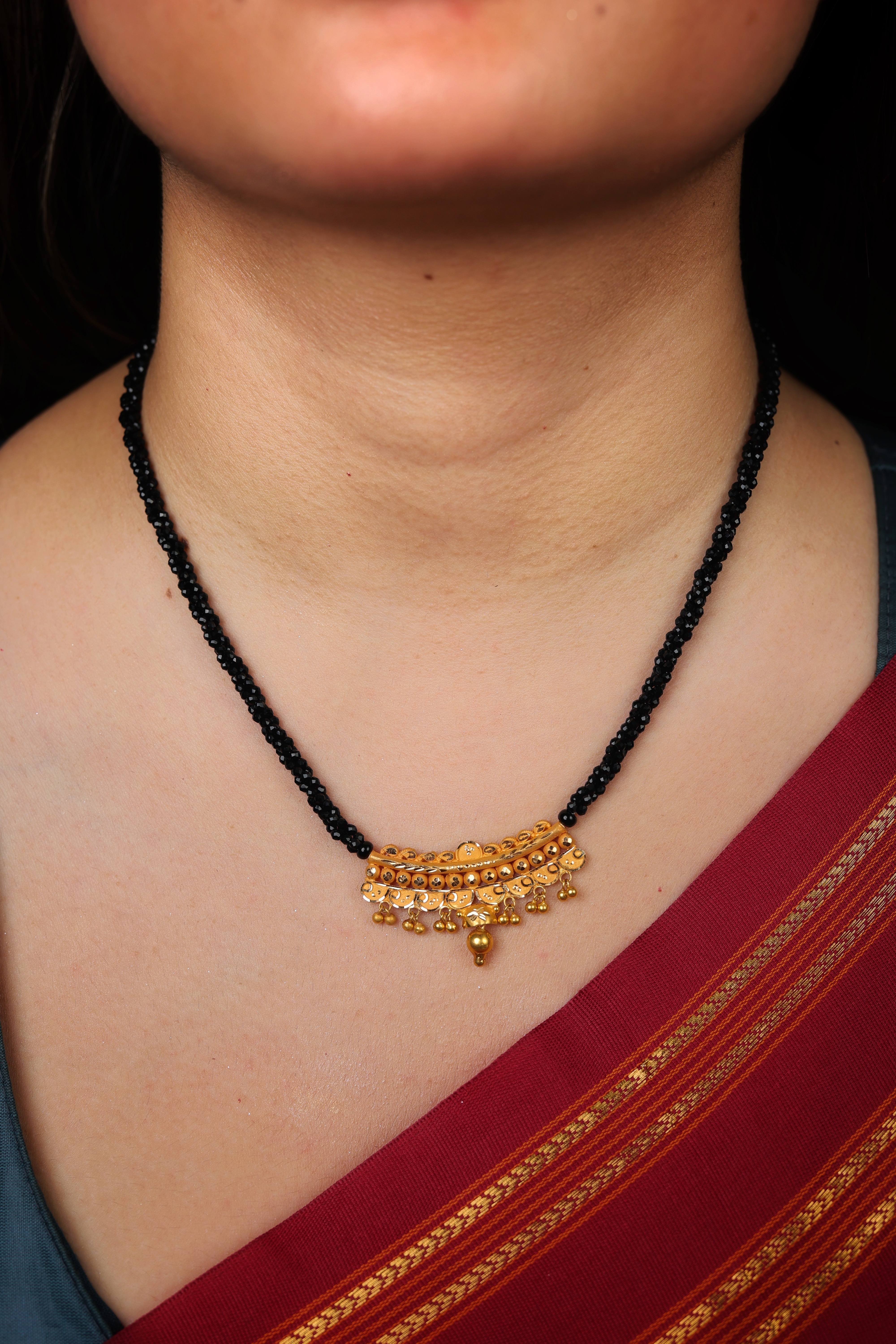 Traditional Curved Arch Gold Pendant Mangal Sutra with Black Beads