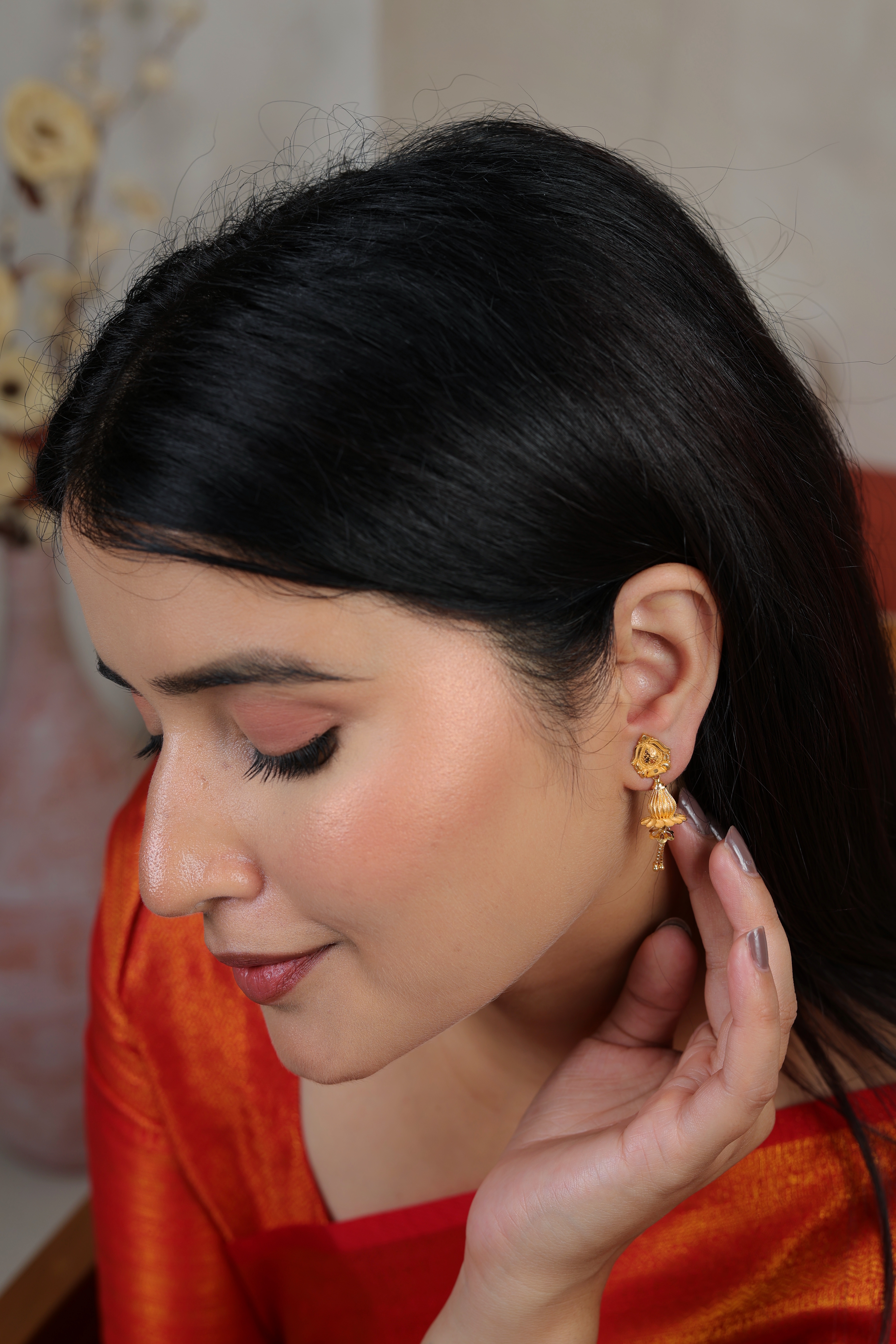 Artisan Paisley Stud Gold Jhumki Earrings with Flared Tassel Drop
