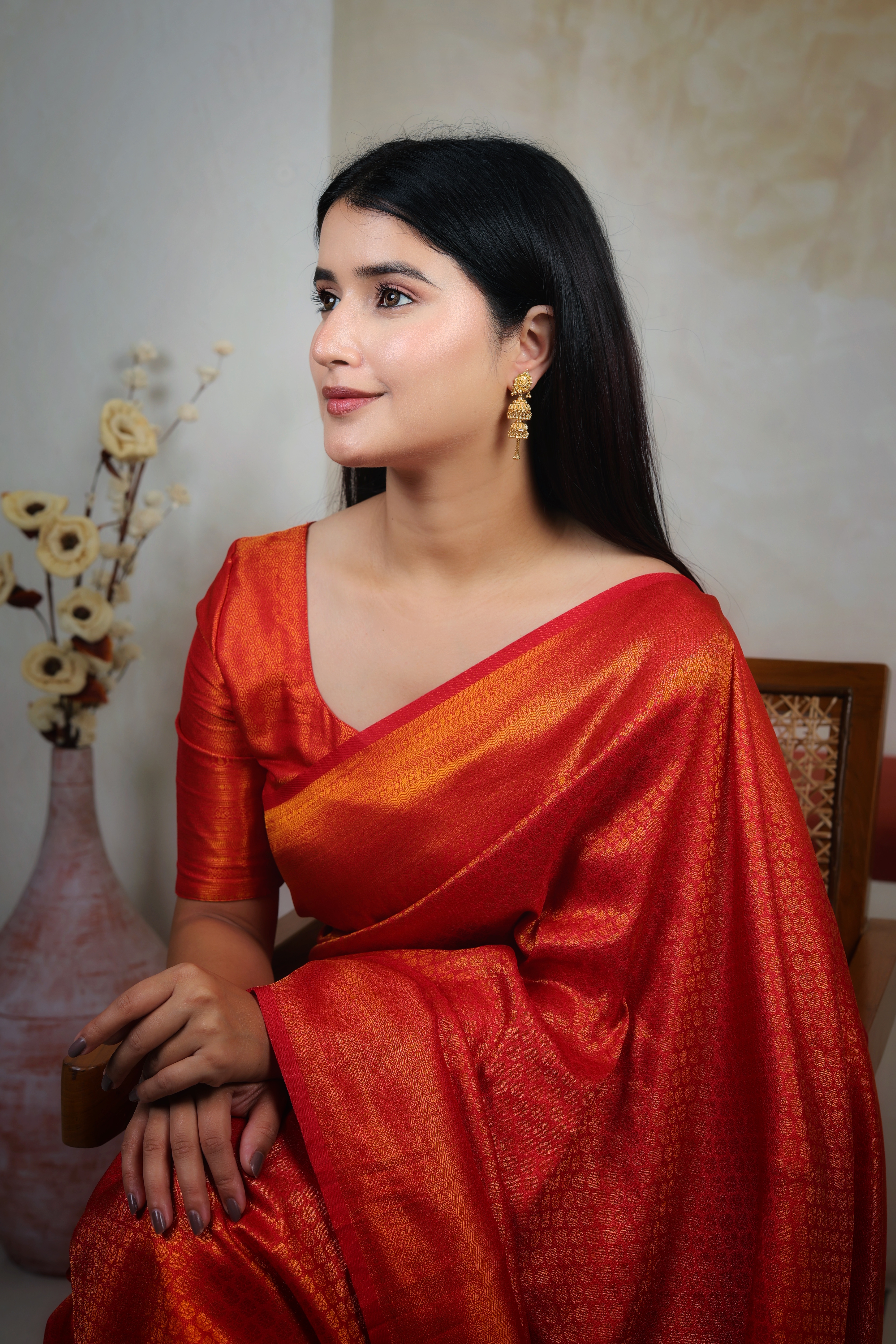 Ornate Sun-Medallion Gold Jhumki Earrings with Double-Tier Filigree Drop