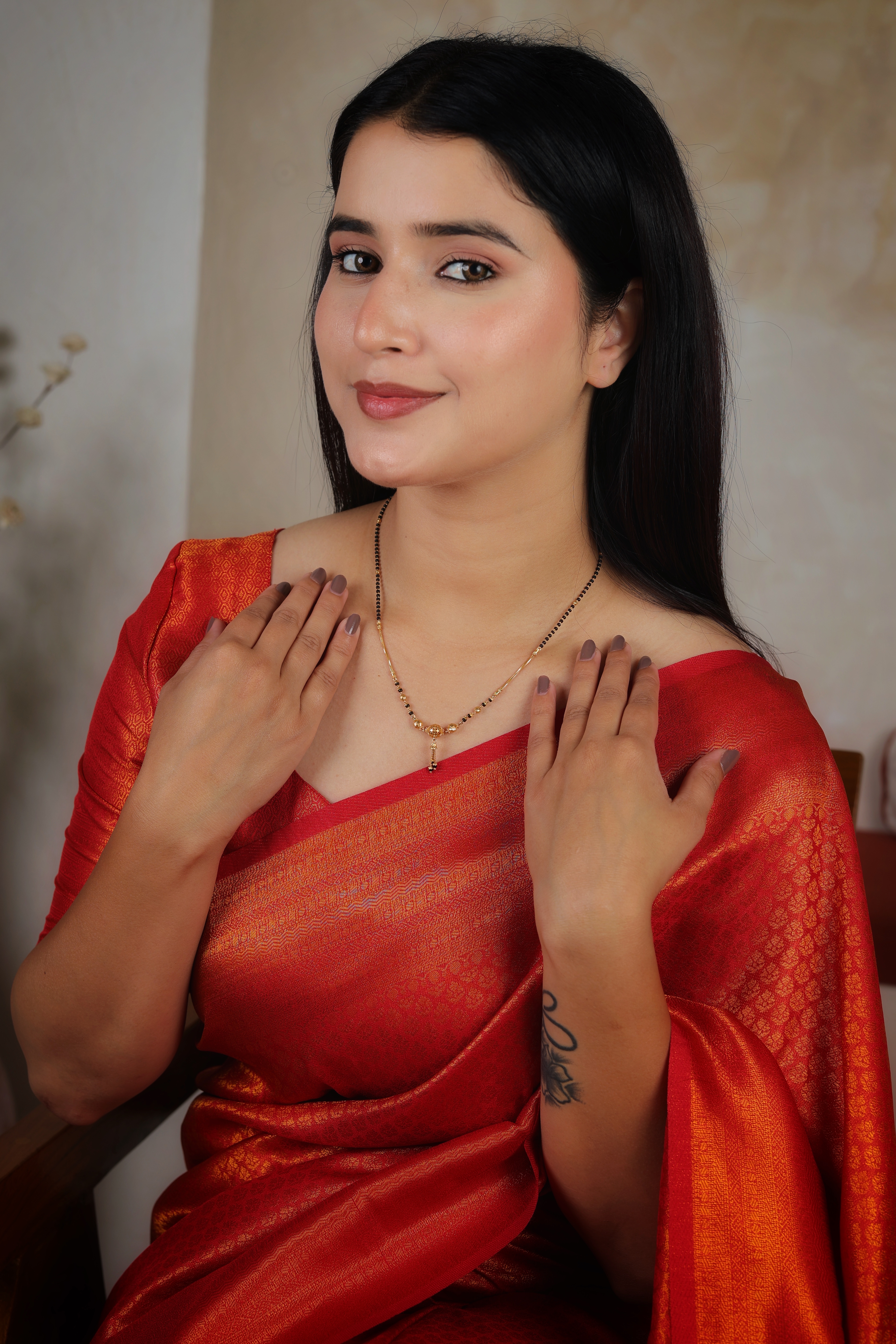 Refined Gold Link Short Mangalsutra with Central Filigree Orb and Delicate Black Bead Tassel