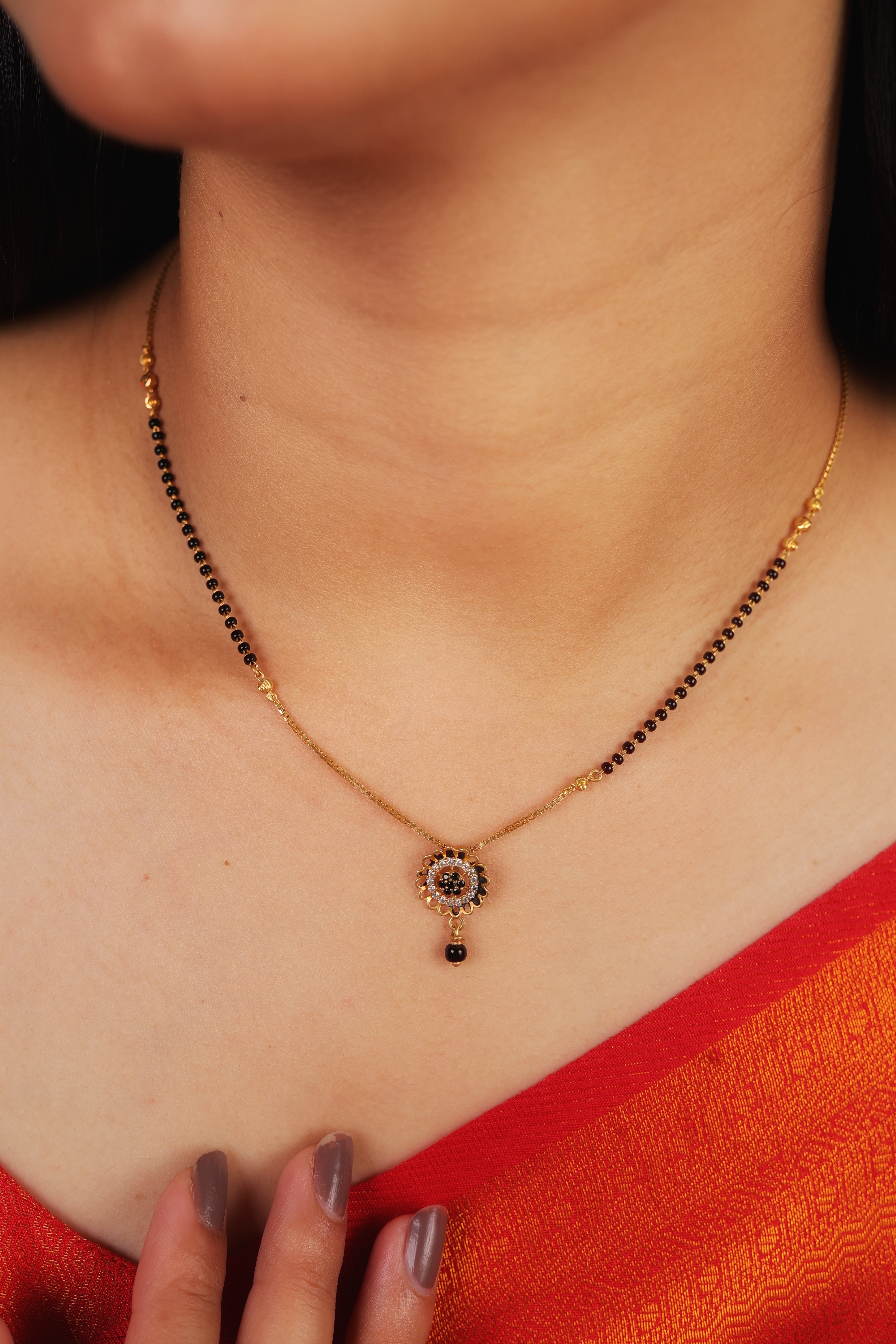 Elegant 22K Gold Short Mangalsutra with Shimmering Stone-Encrusted Floral Medallion