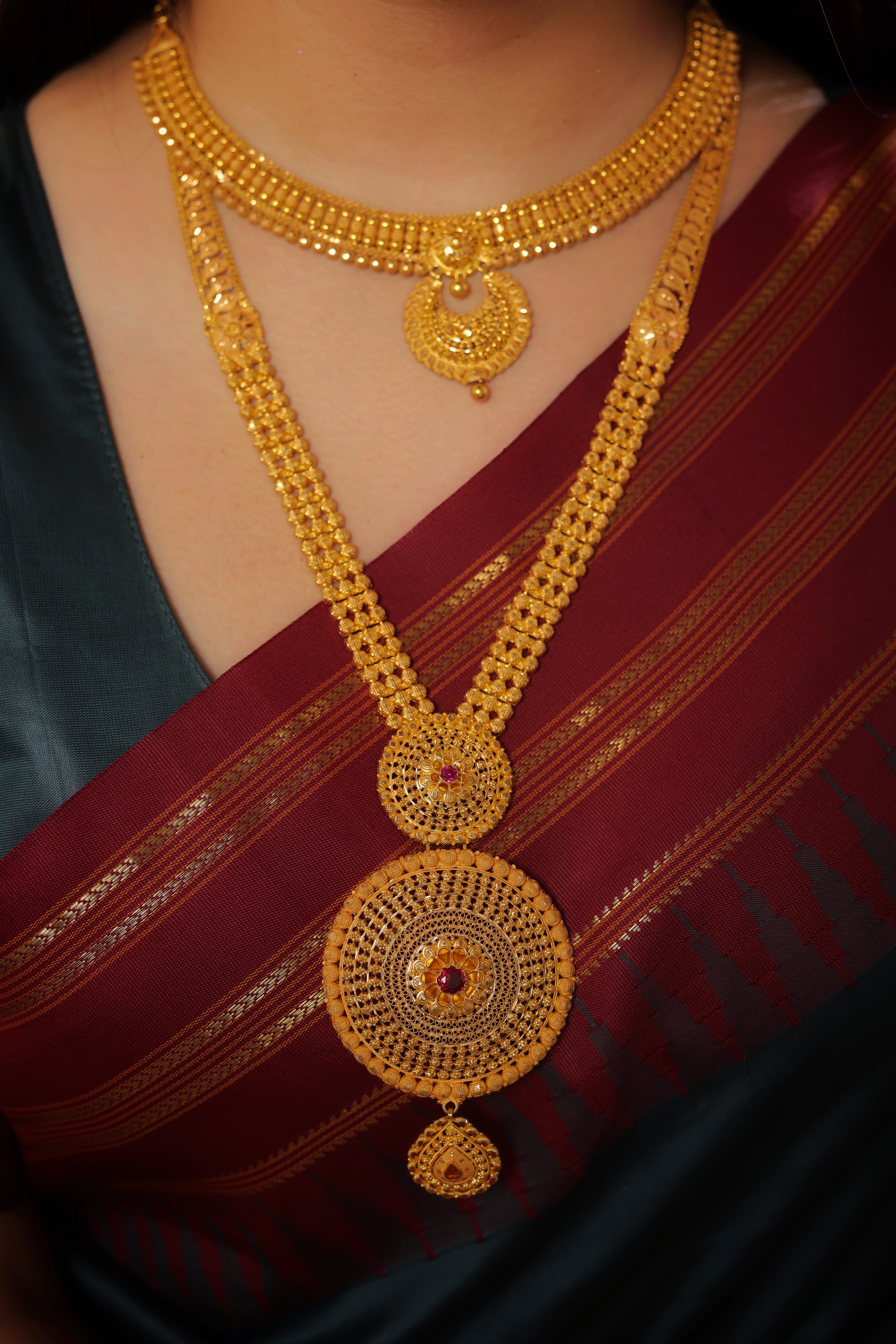 Majestic 22K Gold Rani Haar with Dual Ruby-Centered Medallions and Ornate Triple-Strand Chain