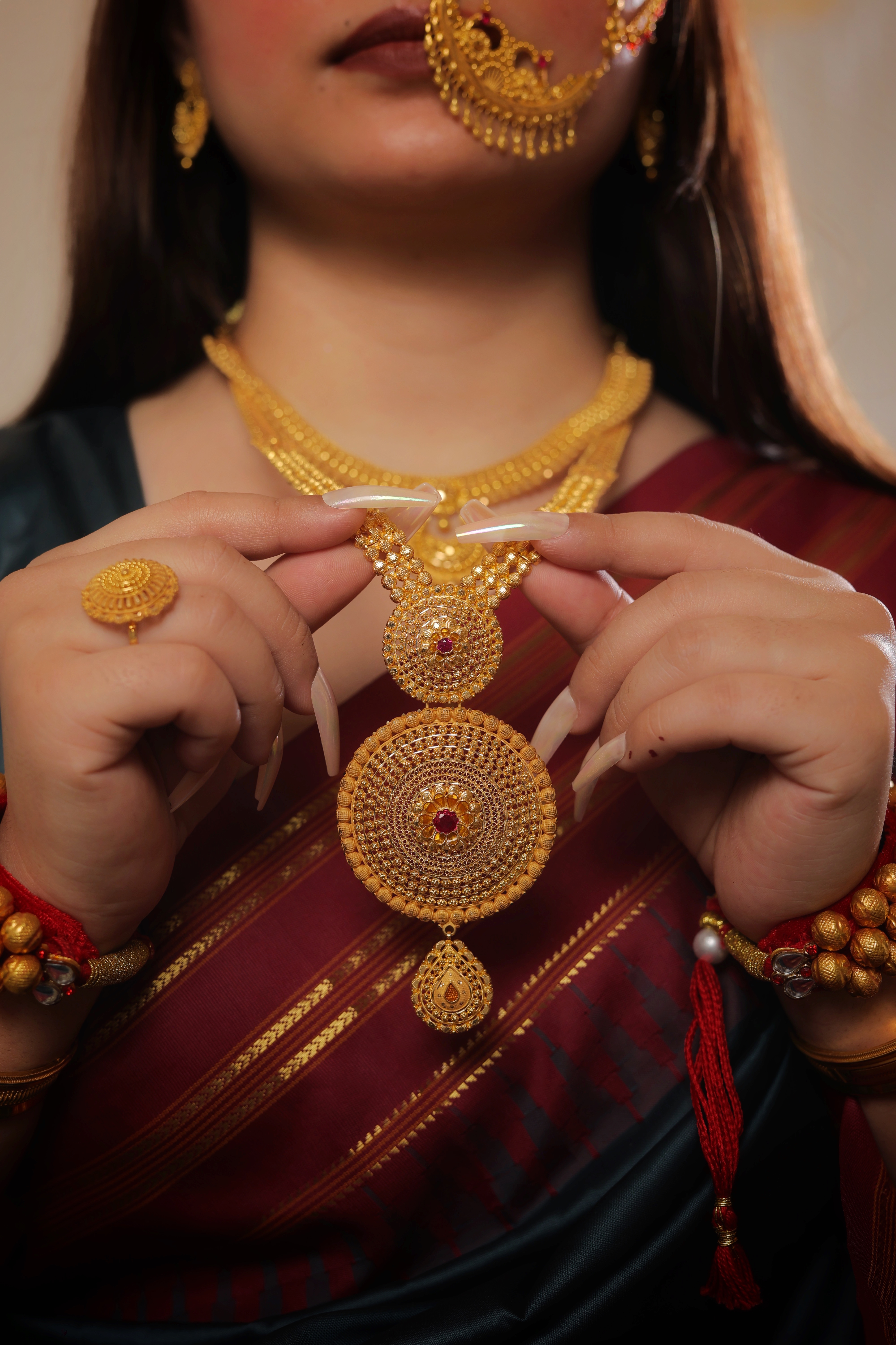 Majestic 22K Gold Rani Haar with Tiered Ruby Medallions and Ornate Textured Chains