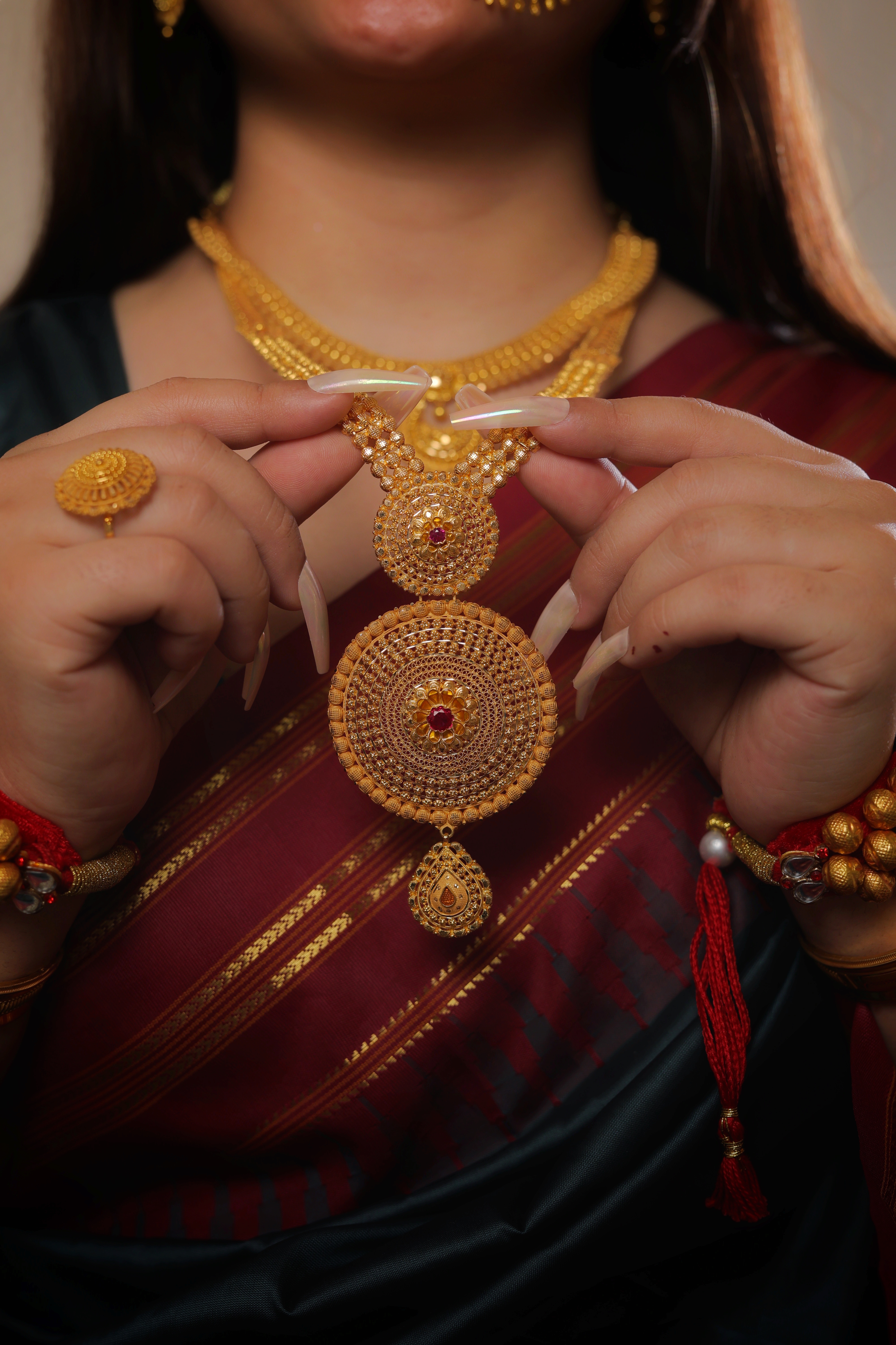 Majestic 22K Gold Rani Haar with Tiered Ruby Medallions and Ornate Textured Chains