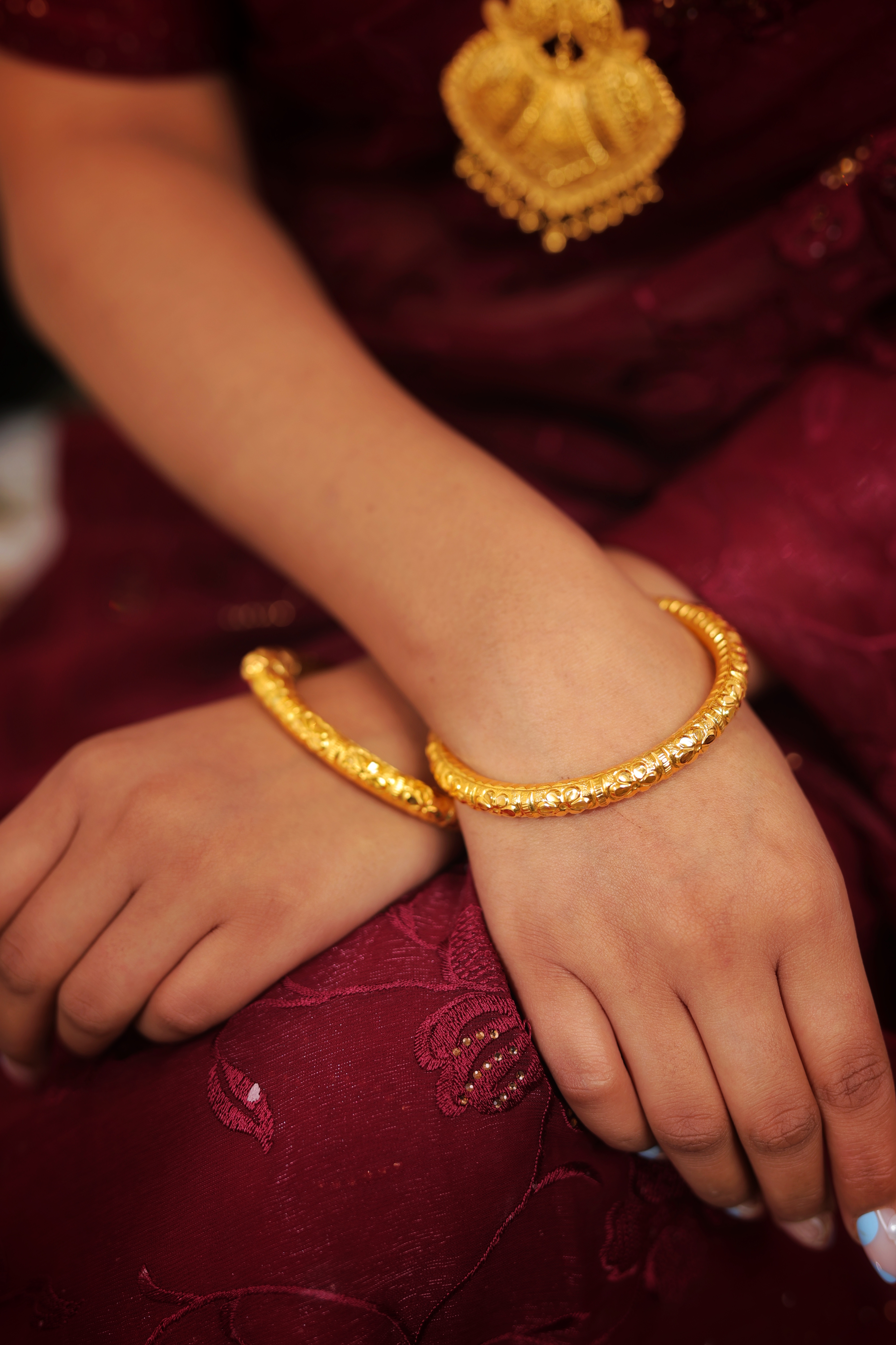 Traditional 22K Gold Bangles with Floral Engraved Design